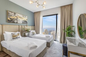 3 chambres, coffre-fort, fer et planche Ă repasser