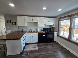 Microwave, oven, stovetop, dishwasher - Brand new, spacious 3-bedroom apartment close to Ball State and IU Health. (Muncie)