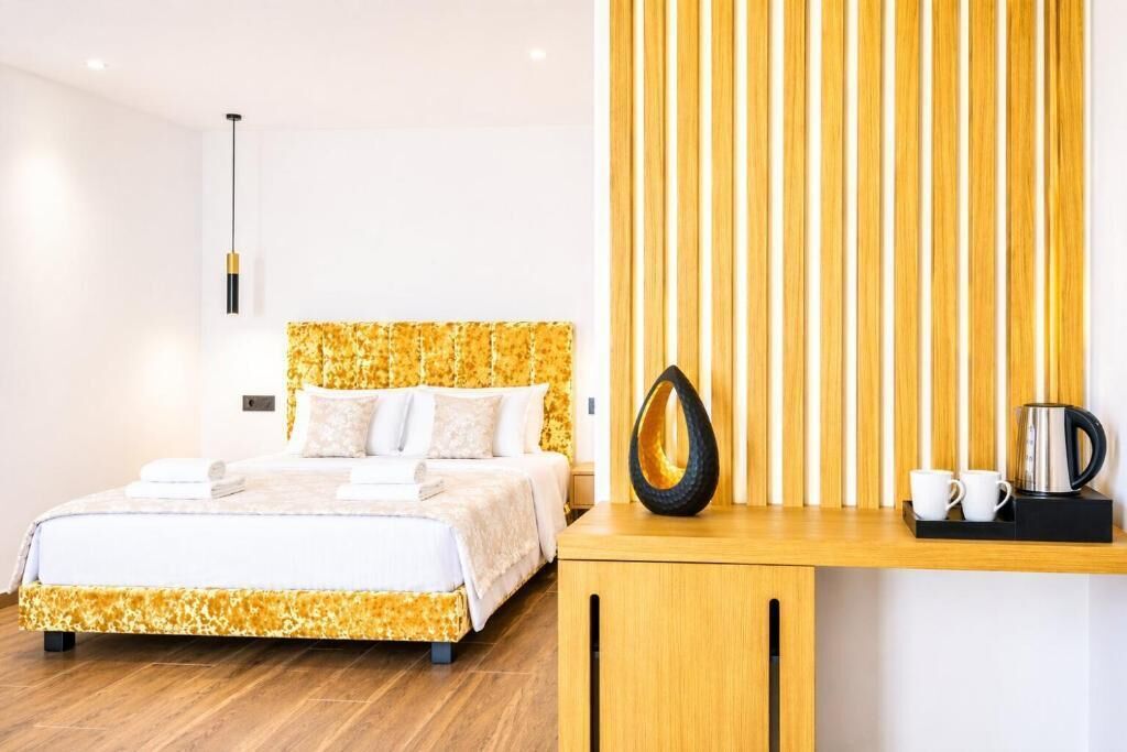 ห้องดีลักซ์สวีท, ระเบียง, เห็นวิวทะเลบางส่วน | ตู้นิรภัยในห้องพัก, เตารีด/โต๊ะรีดผ้า, Wi-Fi ฟรี