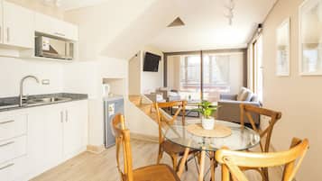 Appartement Supérieur, vue partielle sur la mer | Coin séjour