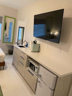 Microwave, stovetop, coffee/tea maker, electric kettle
