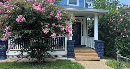 Entire two kitchen home including basement studio w/ parking, deck, and yard.