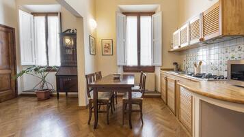 Comfort Apartment | Private kitchen | Fridge, stovetop, electric kettle, cookware/dishes/utensils