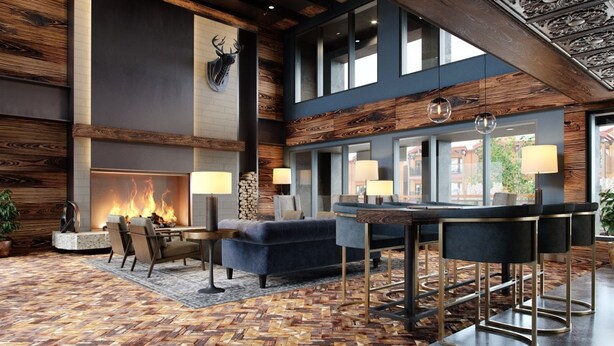 Un interior moderno con chimenea, zona de estar y bar.
