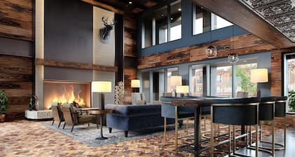 Breck Hotel Room | King Bed & Relaxing Lounge