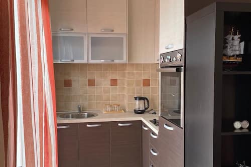 Estudio clásico, vista a la ciudad | Cocina privada
