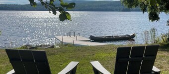 Lakeside Lodging, Elevated - Walk to Village shops and restaurants and enjoy a private lakefront, newly renovated and furnished 1843 home!