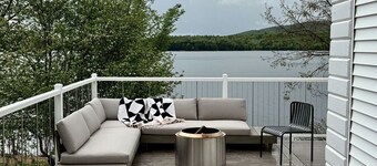 Lakeside Lodging, Elevated - Walk to Village shops and restaurants and enjoy a private lakefront, newly renovated and furnished 1843 home!