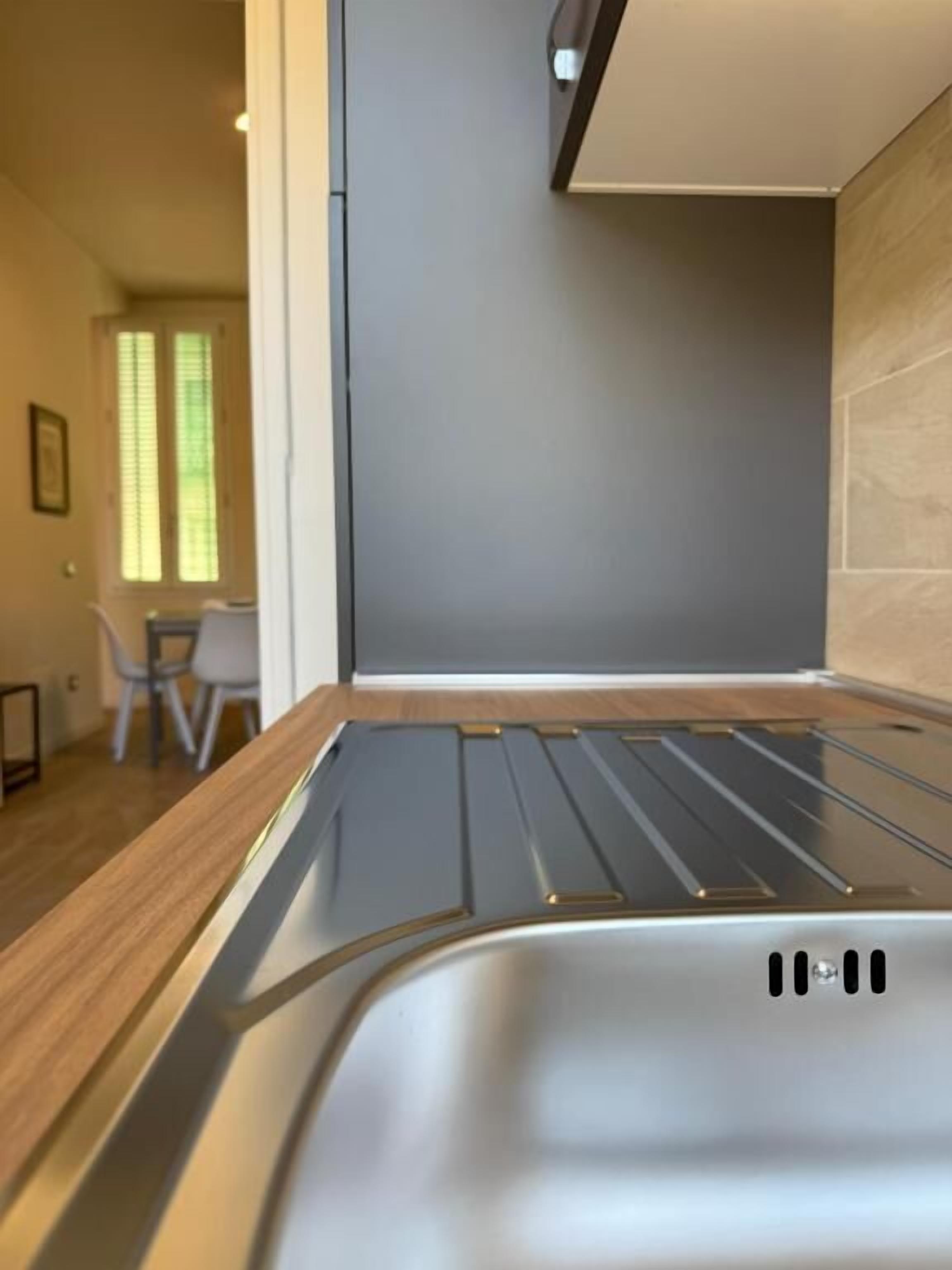 Apartamento urbano | Cozinha privada | Geladeira