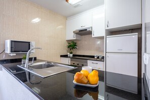 Fridge, microwave, oven, coffee/tea maker