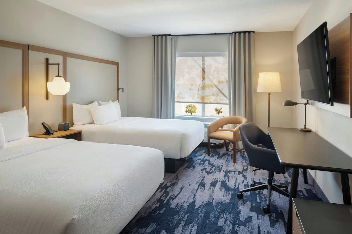 Desk, laptop workspace, blackout drapes, iron/ironing board