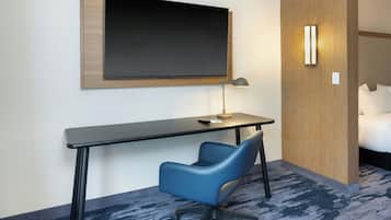 Desk, laptop workspace, blackout drapes, iron/ironing board