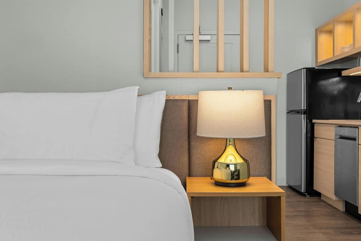 Desk, blackout curtains, iron/ironing board, travel cot