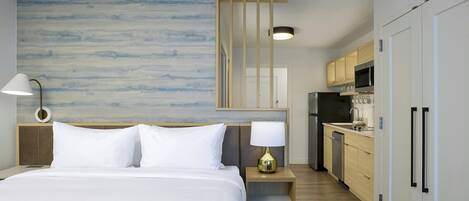 Desk, blackout drapes, iron/ironing board, travel crib