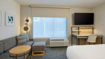 Desk, blackout drapes, iron/ironing board, travel crib