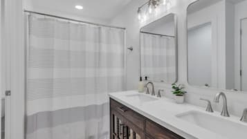 Hair dryer, towels, soap, toilet paper