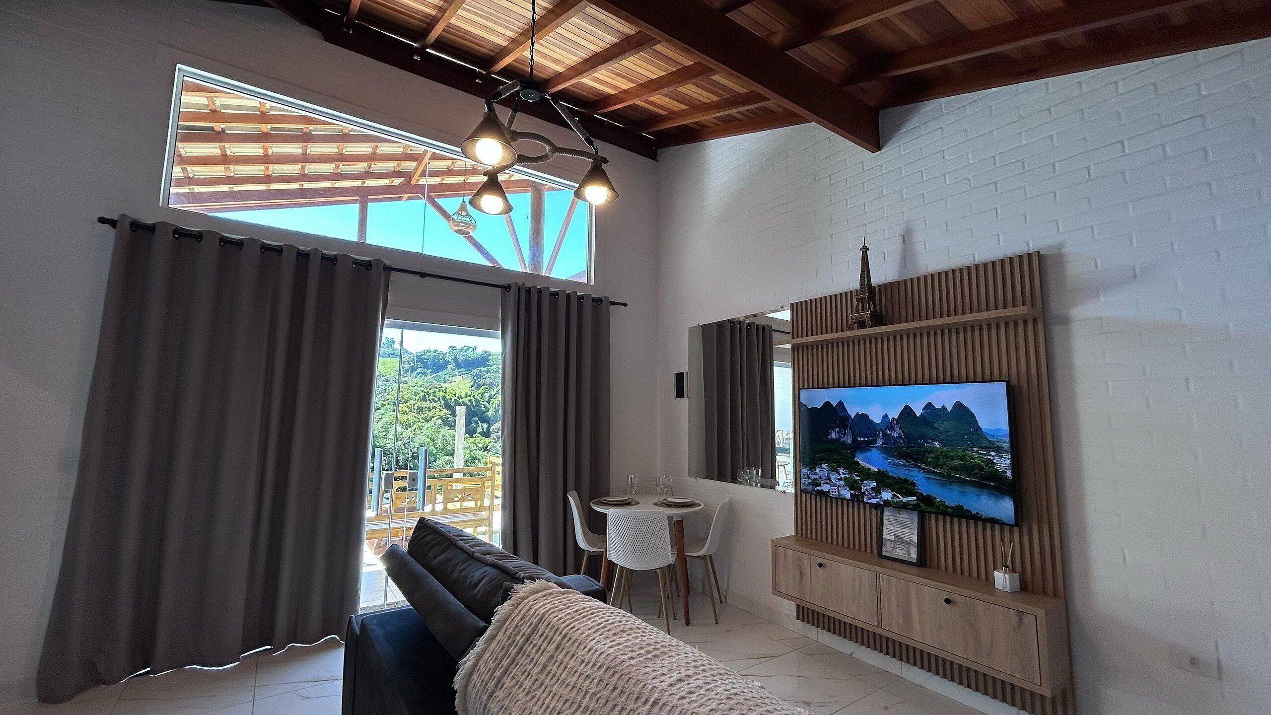 Cabaña | Área de sala de estar | Televisión 