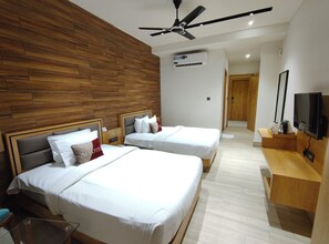 Deluxe Room, 2 Twin Beds | Desk, laptop workspace, blackout drapes, iron/ironing board - Aceotel Premier TK Morbi (Morbi)