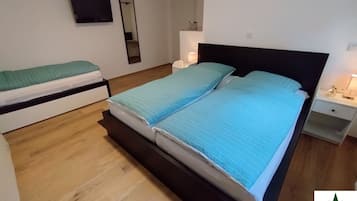 2 habitaciones, caja de seguridad en la habitación y escritorio