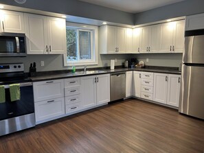 Microwave, oven, stovetop, dishwasher - 3 Bedroom Cottage- 51 Corey Cres (Tobermory)