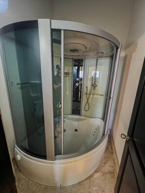 Jetted bath, bidet, towels, soap