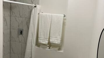 Shower, towels, soap, shampoo