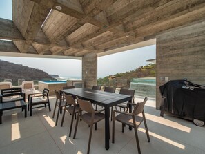 Outdoor dining - Gorgeous 2 bedroom in the surf community of La Bocana with tons of amenities (Santa María Huatulco)