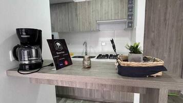 Basic Apartment, Balcony | Private kitchen | Coffee/tea maker, blender, griddle, cleaning supplies