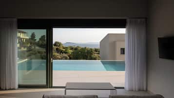 Luxury Villa, Sea View | Living area | Flat-screen TV