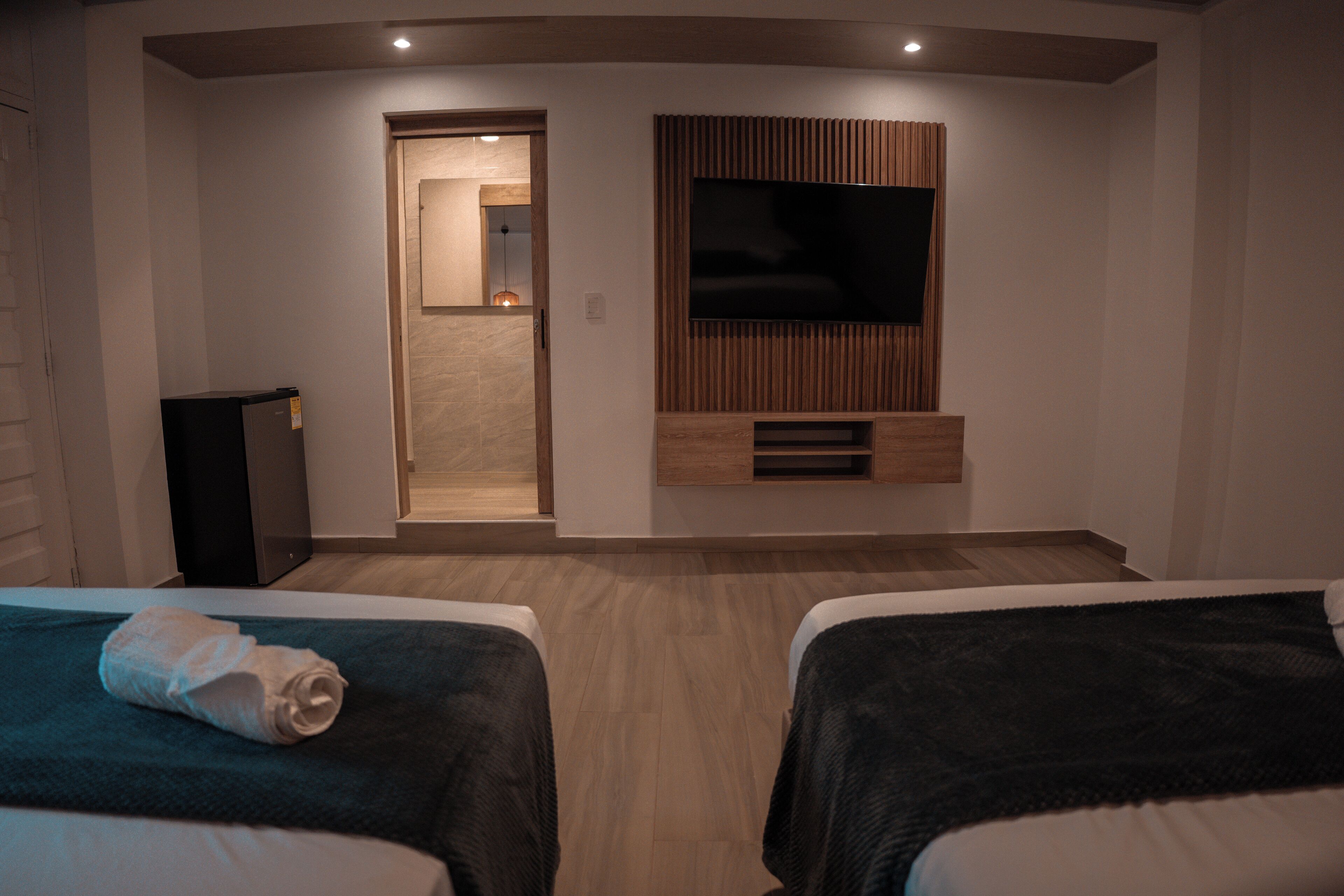 Superior-Vierbettzimmer | Zimmersafe, Verdunkelungsvorhänge, Bügeleisen/Bügelbrett