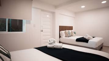 Standard Quadruple Room | In-room safe, blackout drapes, iron/ironing board, free WiFi