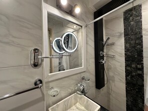 Shower, jetted tub, hair dryer, bidet