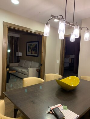 Enjoy meals in the dining area with a table and four chairs.