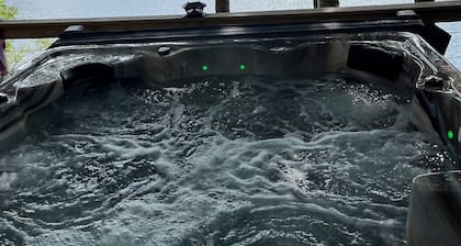 Charming lakefront family Cottage w/ hot tub and fire pit!