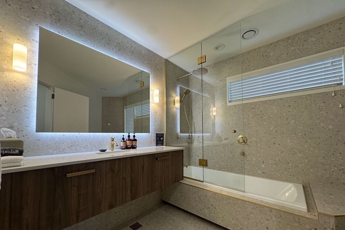 Separate tub and shower, hair dryer, towels, soap