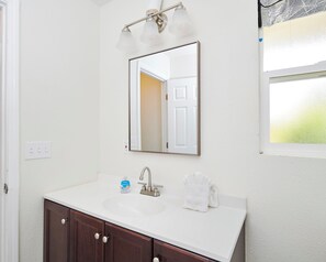 Hair dryer, towels, soap, shampoo