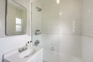Hair dryer, towels, soap, shampoo