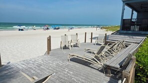 On the beach, sun loungers, beach towels
