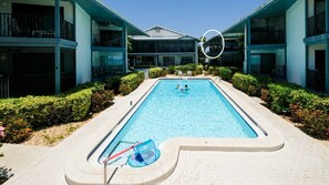 Outdoor pool, a heated pool - GULF BEACH VIEW w/ Heated Pool,  FREE WiFi & Trolley, Great Sunsets! (Holmes Beach)
