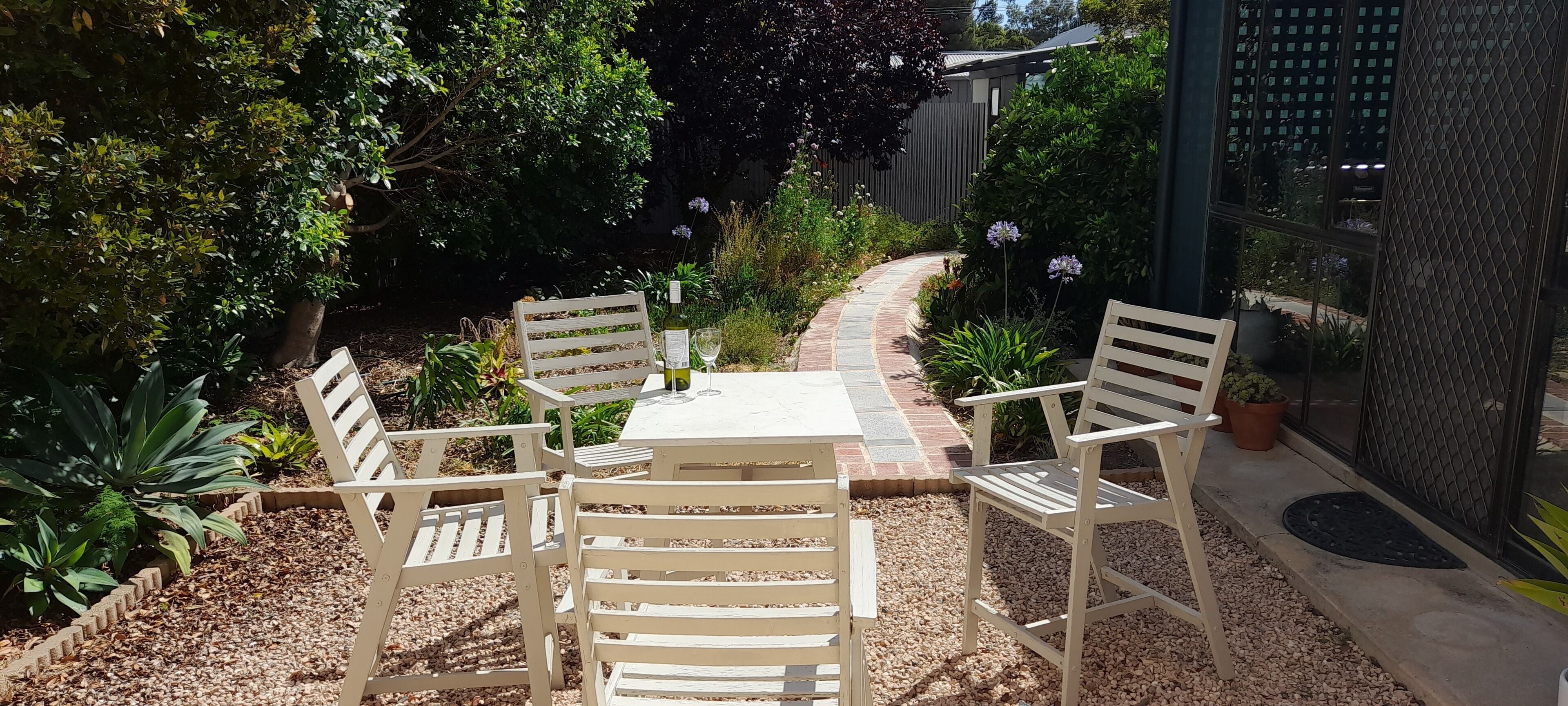 Sunny courtyard with seating area