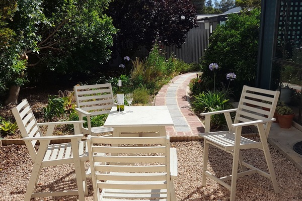 Sunny courtyard with seating area