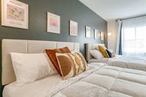 1 bedroom, desk, bed sheets