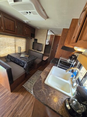 Fridge, microwave, stovetop, coffee/tea maker
