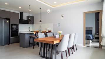 Family Villa, 4 Bedrooms, Ensuite, Pool View | Private kitchen | Full-size fridge, microwave, oven, stovetop