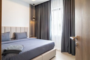 Vila família, 4 quartos, suíte, vista para a piscina | 4 quartos, cofres nos quartos, escrivaninha, cortinas blackout