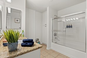 Hair dryer, towels, soap, shampoo