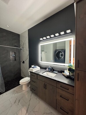 Hair dryer, towels, soap, toilet paper