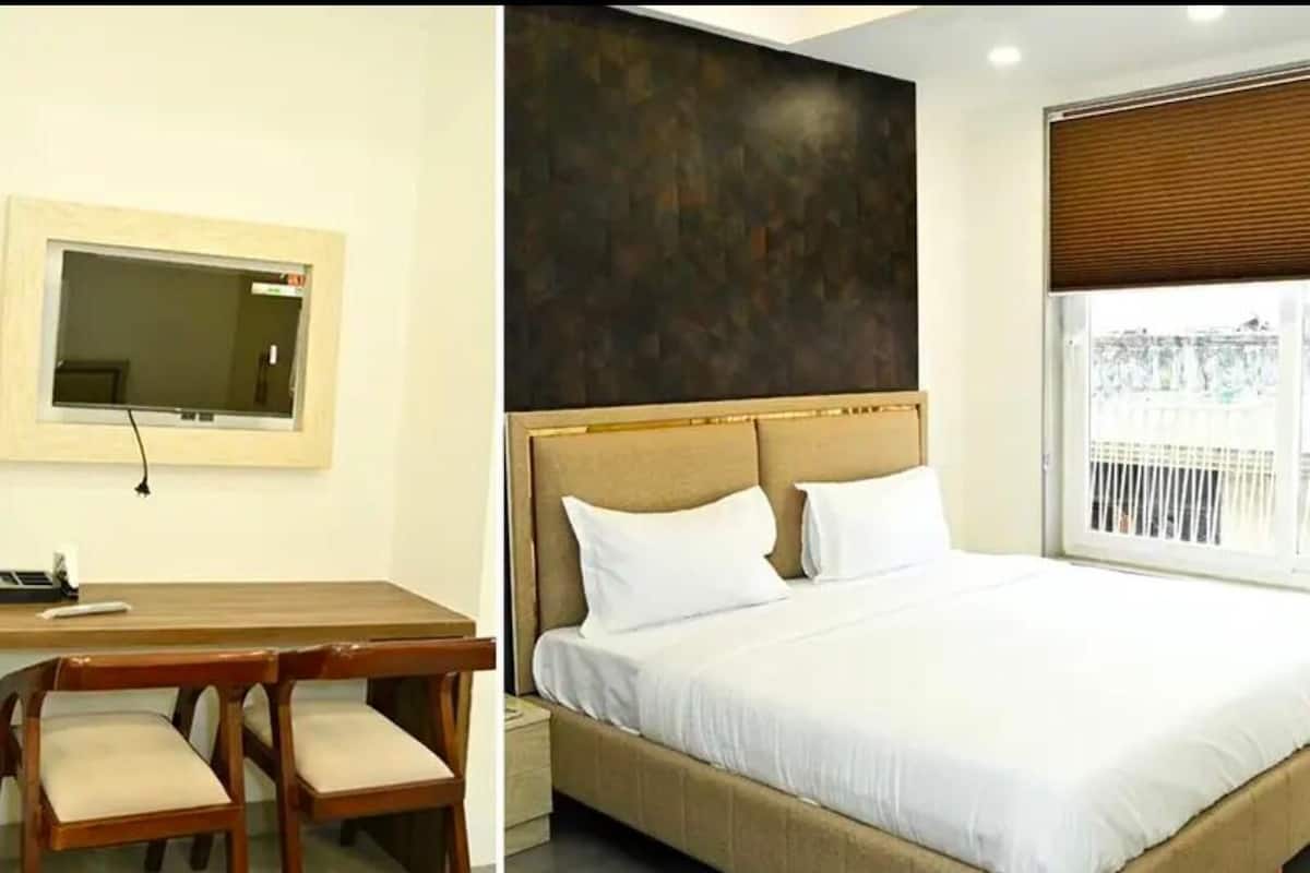 Deluxe Double Room, City View | 2 bedrooms, in-room safe, blackout curtains, free WiFi