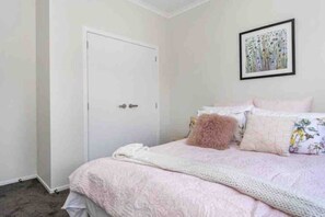 4 bedrooms, iron/ironing board, travel cot, WiFi