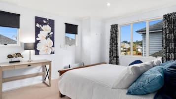 4 bedrooms, desk, iron/ironing board, travel cot